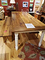 Accented with painted legs, this matching table and bench was displayed at the Artful Eye in St. Johnsbury, Vermont.